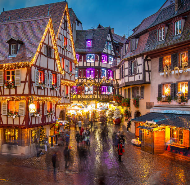 istock Charming festive market in a historic town square during the evening glow 2189366185