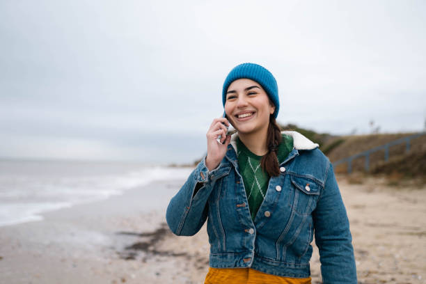 istock Enjoying a nice winter day at the beach 2189366811