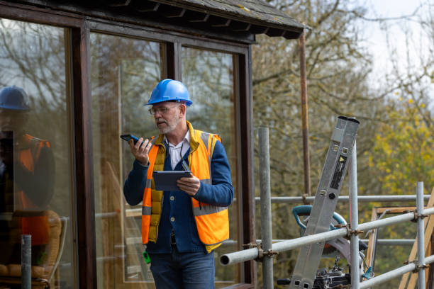 istock Building Inspector on the Phone 2189366943