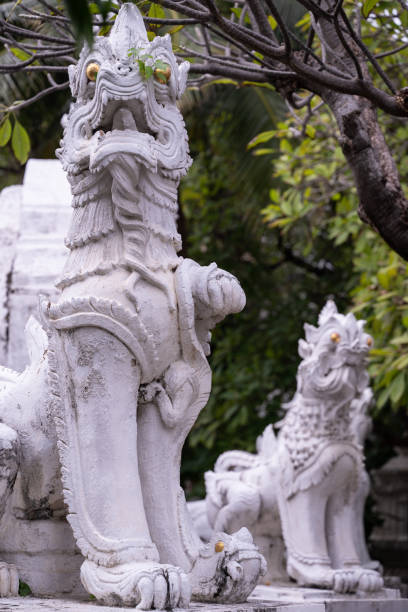 istock Plants and sculptures in a Buddhist Temple 2189367020
