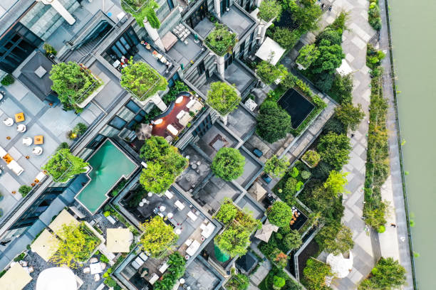 istock Aerial view of modern city streets covered with greenery 2189367397