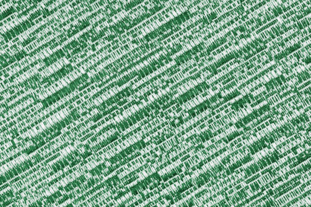 Melange green and white fabric texture, mixed color textile background. Close up, macro of jacquard  cloth with diagonal coarse weaving. Wallpaper, backdrop