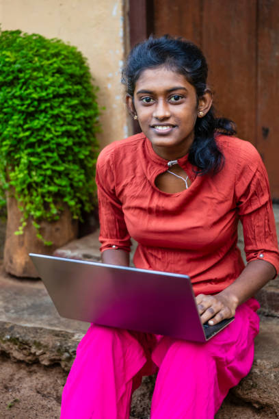 istock Sri Lankan young woman using a laptop 2189369726