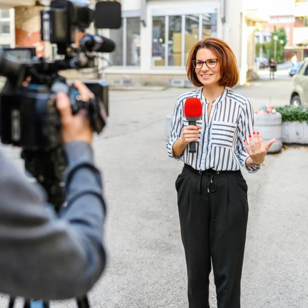 istock Female TV reporter 2189370444