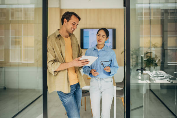 istock Colleagues Discussing Strategies and Data Insights 2189370611