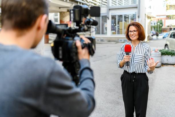 istock Female TV reporter 2189371338