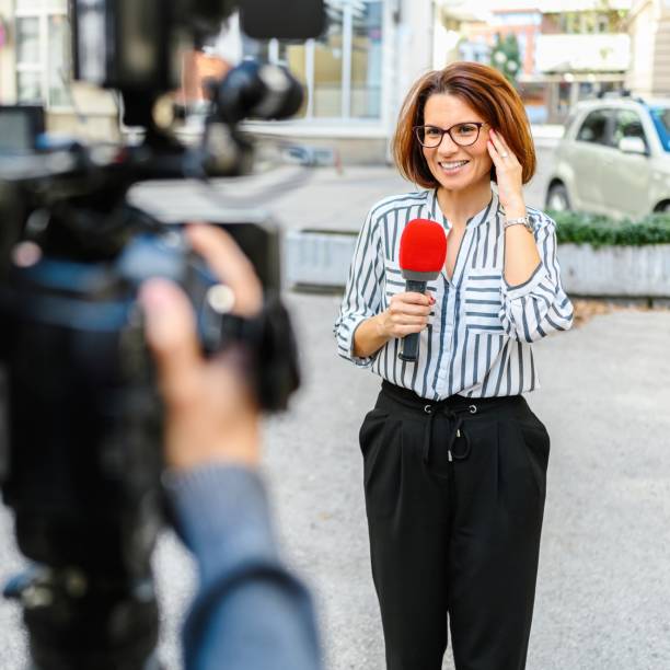 istock Female TV reporter 2189373683