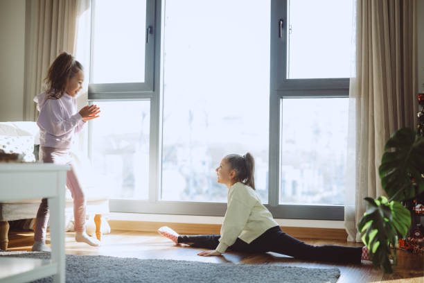 istock Playful children in living room 2189374538