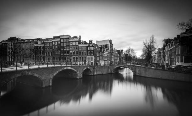 istock Charming canals of Amsterdam reflect historic architecture at dusk 2189374981