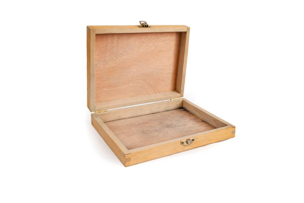 Empty shallow wooden case with open lid, abstract backdrop for product placement, soft focus close up isolated on white