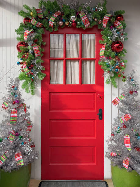 istock Red door at Christmas 2189375863