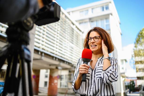 istock Female TV reporter 2189378108