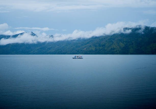 cloudy sky over the sea and mountains, natural landscape background.