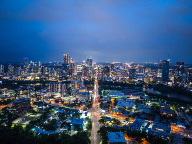 istock Austin, Texas skyline shining brightly at twilight with city lights creating a captivating display across the cityscape, mirroring vibrant spirit of an american metropolis 2189379956