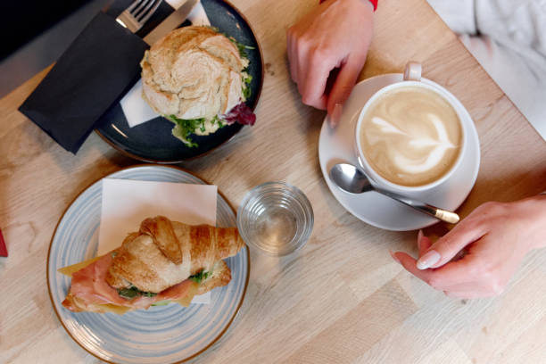 istock Croissant with herbs and meat, sandwich with cheese , coffee with milk 2189380973