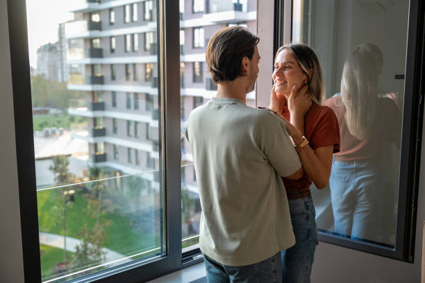 istock Young man looking to his girlfriend with love and smiling 2189383922