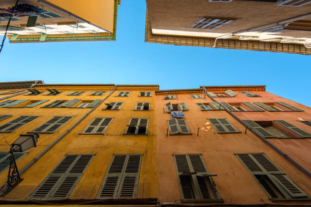 istock Bright colored buildings against a clear blue sky in an urban setting 2189385405