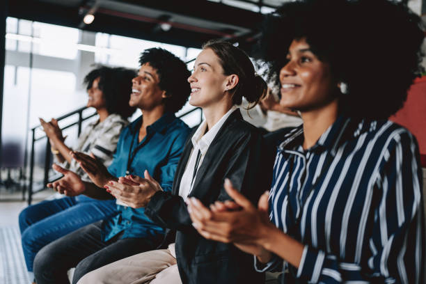 istock Group of people applauding lecture 2189387048