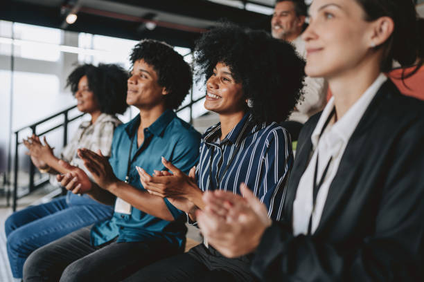 istock Group of people applauding lecture 2189387098