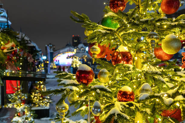 istock christmas tree on the street 2189387220