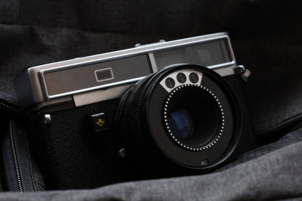 istock An old film camera on a dark background in a low key 2189389204