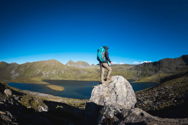 istock Hiking woman on high altitude mountain top 2189389241