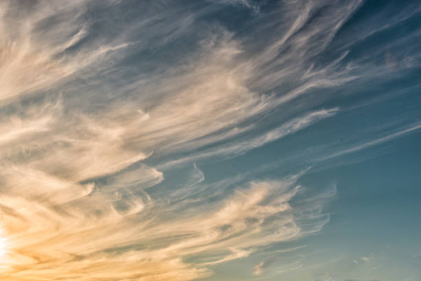 Bright morning heavenly cloud landscape with cirrus clouds in the blue sky
