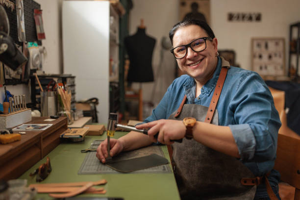 istock Craftswoman Designing a High-Quality Leather Wallet 2189393986