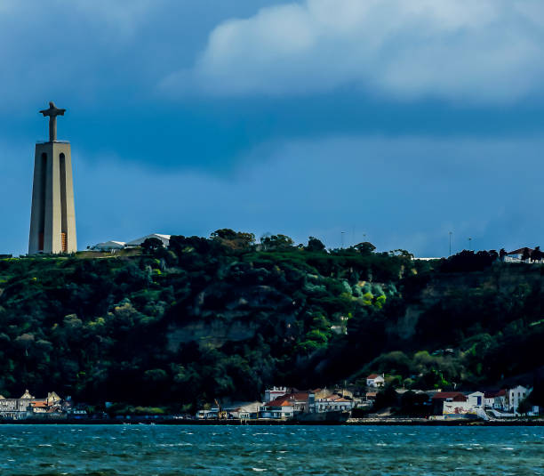 istock A mountain with a church on top and a town below 2189395110