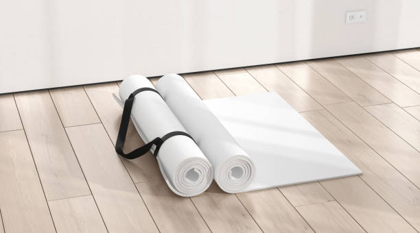 istock Blank white rolled yoga mat on floor shadow mockup 2189397917