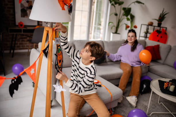 istock Kids Preparing for Halloween Celebration Together 2189399907