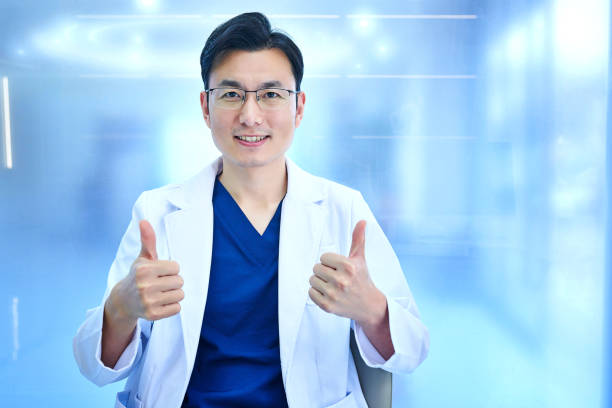 istock Asian Doctor Portrait at Frosted Glass Backgrounds 2189400607