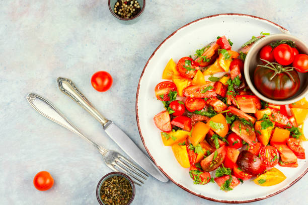 istock Salad of multi-colored tomatoes. 2189400778