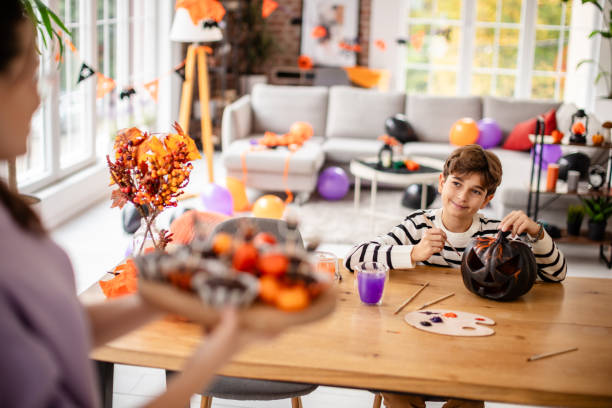 istock Crafting spooky pumpkin for Halloween festivities 2189401002