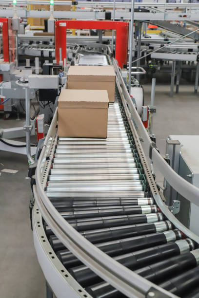 packing line in a logistics warehouse. conveyor belt in a modern production line
