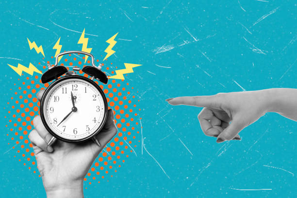 istock Modern art collage featuring a hand with a ringing alarm clock and a hand pointing at the alarm clock. 2189403343