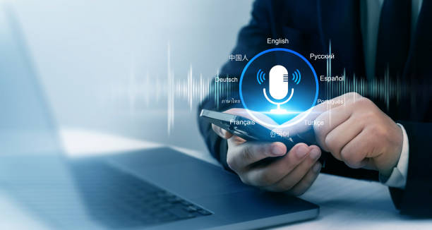 istock Translations using the microphone voice.Translator language course and education. Businessman use smartphone for translate language.Translate languages technology concept. 2189403956
