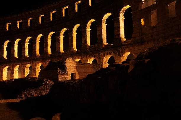 Pula is a coastal city in Croatia famous for its Roman heritage and well-preserved Arena amphitheater. It has beautiful beaches, historical sites like the Temple of Augustus, and a lively city atmosphere with cafes and restaurants.