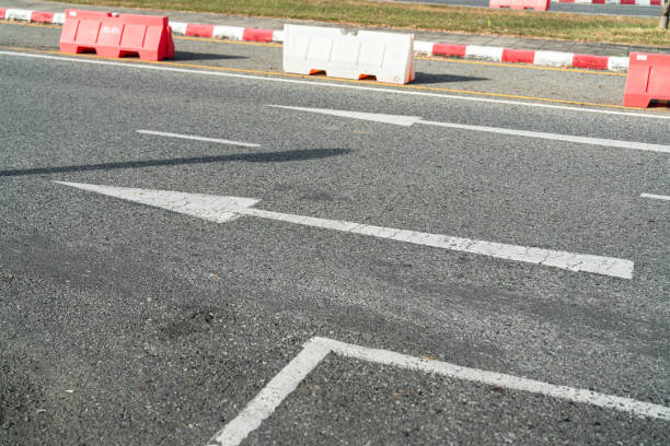 istock An arrow on asphalt road for traffic direction. 2189405085