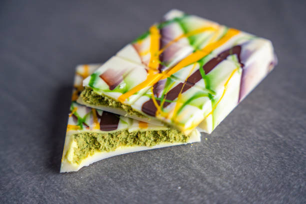 istock Trend Dubai white chocolate with pistachio paste and kataifi dough. Confectionery handmade sweets at home in the kitchen. 2189405129