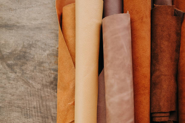 istock leathers in Brown Tones.Textured Suede Fabric Rolls. Collection of Suede Fabric Textures.Variety of Textured Leather Hides.Close-Up of Brown Leather Textiles. 2189405253
