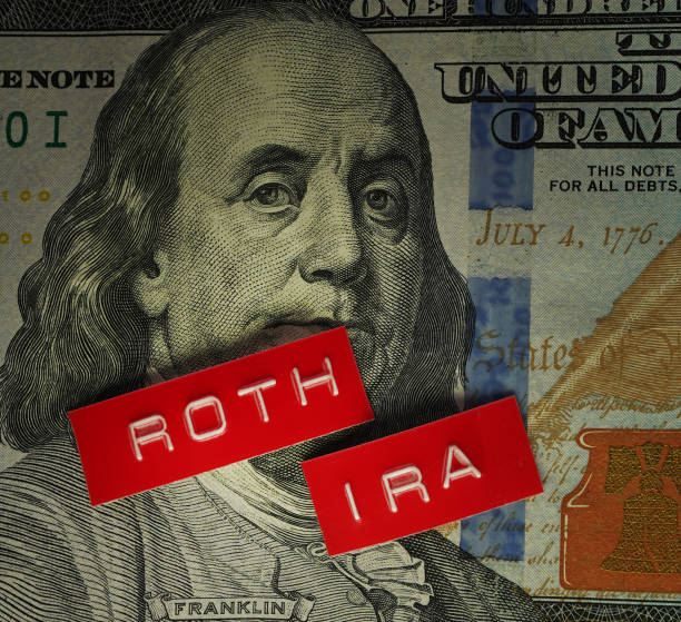 istock Roth IRA labels on a hundred dollar bill -- retirement savings concept 2189405562