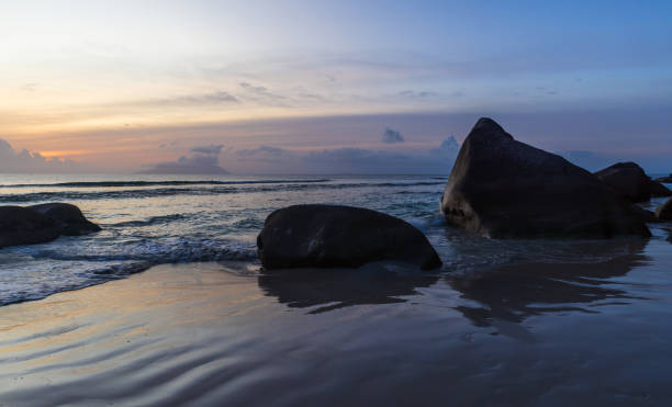 istock Beau Vallon Beach landscape with wet sand and stones 2189409351