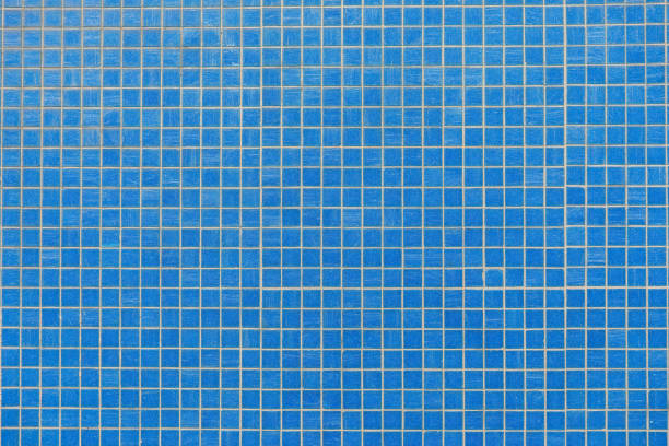 istock Textured Old Blue Pool Wall with Weathered Paint Background 2189409526