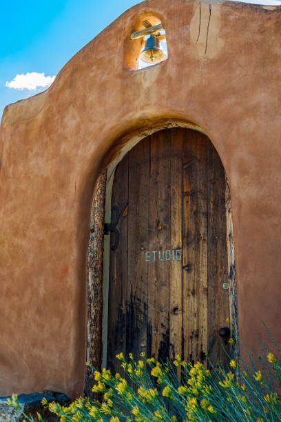 istock Wooden Door and Adobe Architecture at Art Studio, 2189417276