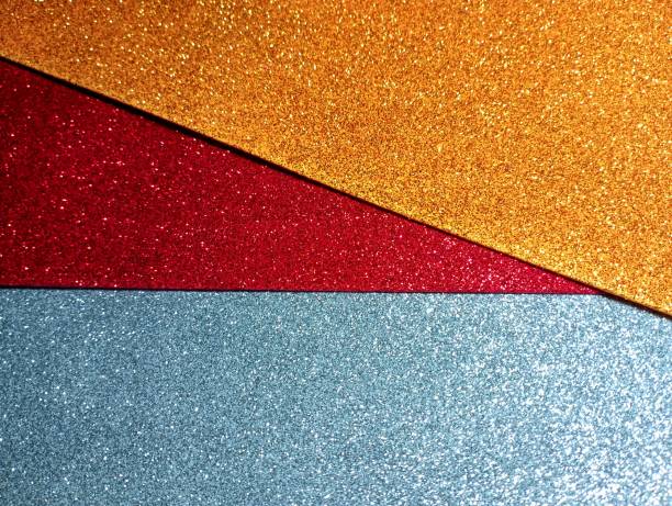 istock Multicolored shiny structured soft material for creating decorations. Background of yellow, red and gray decorative material. 2189418720