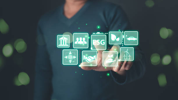 istock man touch screen to save energy,and reduce global warming,climate change,ecology friendly investment,ESG environment social governance,Green Business Innovation and Sustainable Development concept. 2189419966