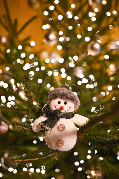 Snowman on Christmas tree.
