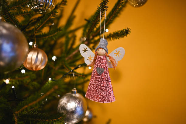 Cute angel on Christmas tree.