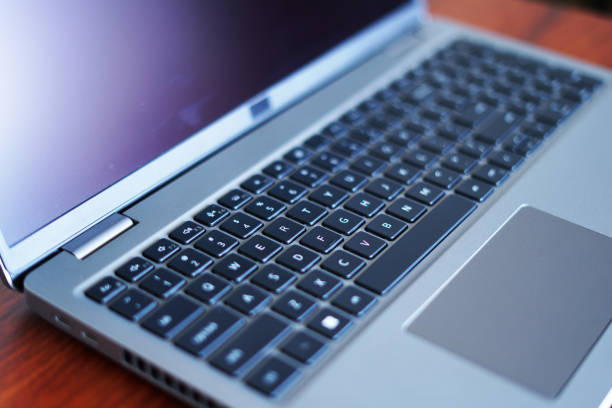 istock laptop touch pad and key board keys. closeup image 2189424891